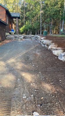 Decorative stone retaining wall with crusher run