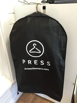 Press garment bag. Nice and clean.