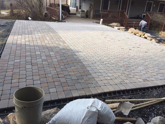 A brick driveway.