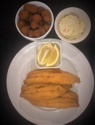 Three piece Catfish dinner  served with a choice of two of our famous sides