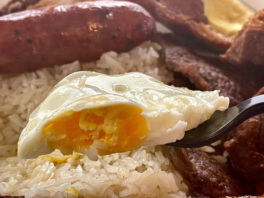 Egg in Bandeja Paisa more like medium to over hard vs over easy