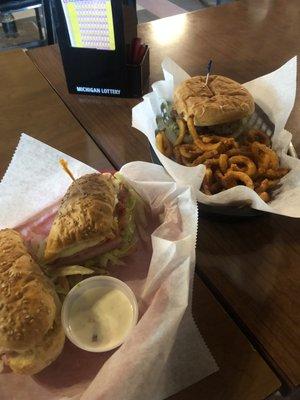 Burger and a slim John with curly fries