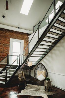 Love the sitting area tucked underneath the staircase.