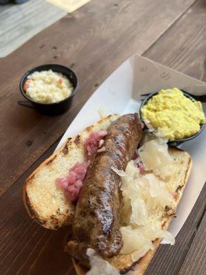 Brat with Hatch Green Chili, potato salad and hubby's coleslaw.