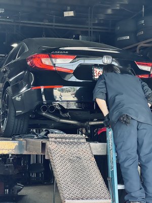 Rear Bumper Diffuser and Dual Exhaust Muffler Tips installed.