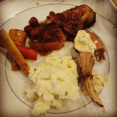 Herbed lamb with horseradish cream, and duck breast with confit leg in a red wine sauce