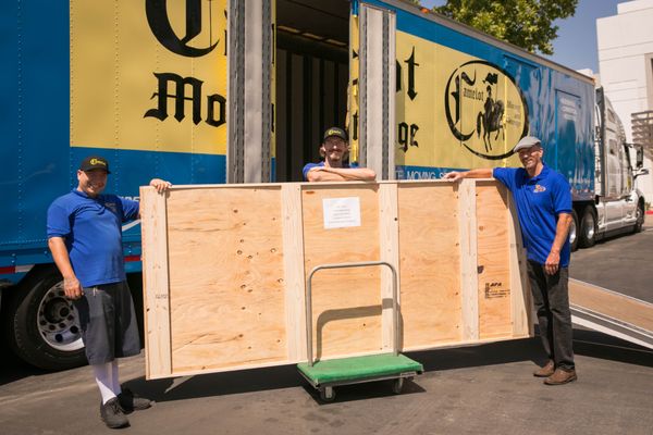 Each crated item is tagged at completion  and prepared for pickup by a carrier of choice of personal transport by our Camelot Team