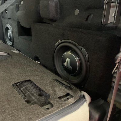 f250 dual 10's box and jl audio tw3 subs