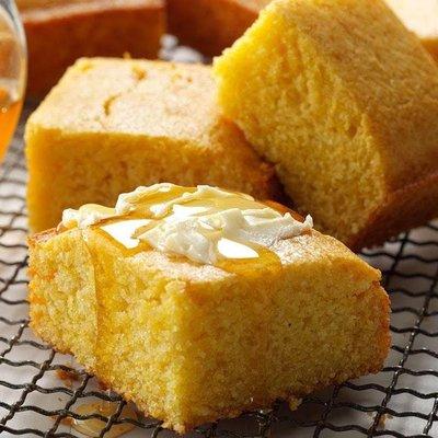 Cornbread - Warm, fluffy cornbread with a slight hint of sweetness, baked to golden perfection.