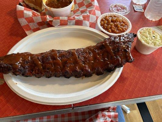 Full slab of ribs with side of baked beans and coleslaw. Awesome!