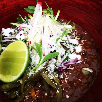 Cumin Lime Beans- cabbage salad, pickled jalapeno, cotija, crema, cilantro