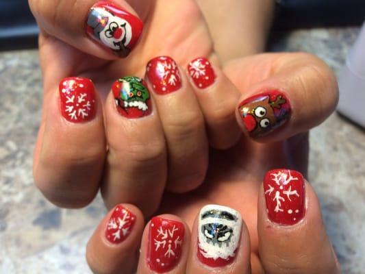 Wow. Crazy Christmas nails. Depending on how intricate the design, the cost is more.