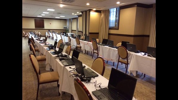 120 PC Laptops for a corporate training session at a hotel in Queens.