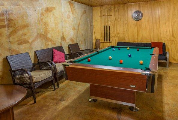 Rec Room located downstairs has TV, Pool table, Kitchenette & 3 futon beds. The sun room and ground floor patio are just outside the door.