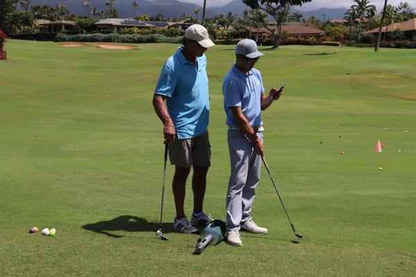 Real time swing analysis at the practice hole.