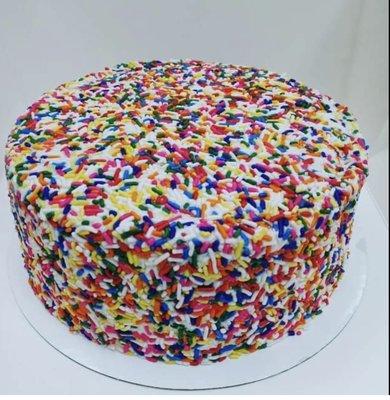 Vanilla cake, vanilla buttercream and sprinkles