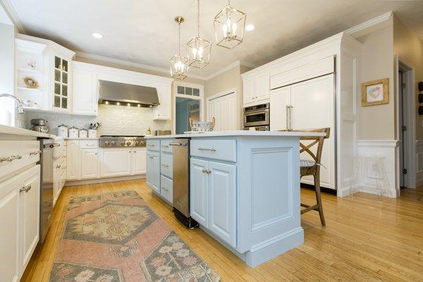 Kitchen remodel using existing cabinetry, light carpentry and cabinet painting.