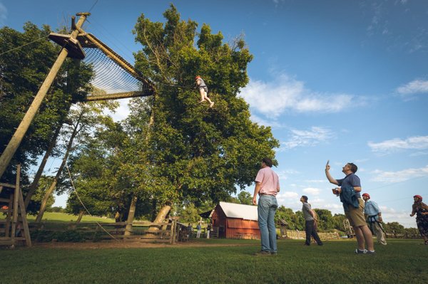 Social hour includes high ropes activities like Calleva's Giant Swing or zip line