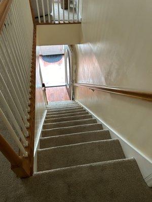 Stairs leading upstairs to some massage rooms.