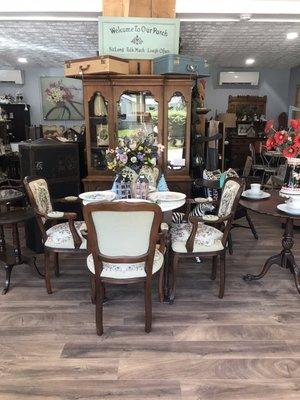 Antique table and chairs and vintage Bassett China cabinet