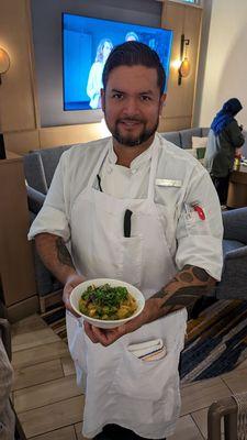 Executive Chef Pedro presenting one of his specialty dishes.