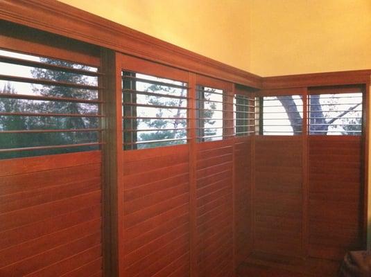 This picture is of a bypass track system shutter.  This Shutter slides back and forth just like your sliding Glass door.