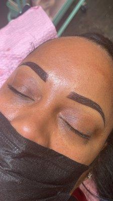 Microshading brows. 
They last up to 3 years with yearly touch up.