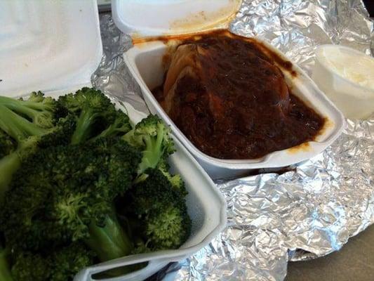 Steamed broc (healthy) and a chili cheese baked potato with side of sour cream (not as healthy)