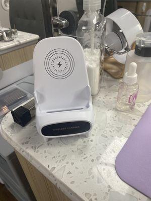 Phone charger at the manicure station