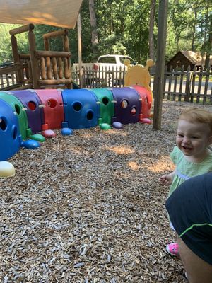 The covered younger playground ( the shade is wonderful for my ginger baby)