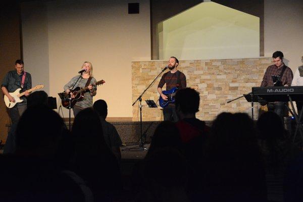 Worship Pastor, Danny Rausch, leading worship during a Sunday morning service.