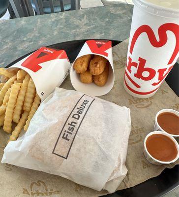 Fish Sandwich Deluxe , Fries, Mozzarella Sticks (4 ea.) and Lemonade with Spicy Sauces on the side