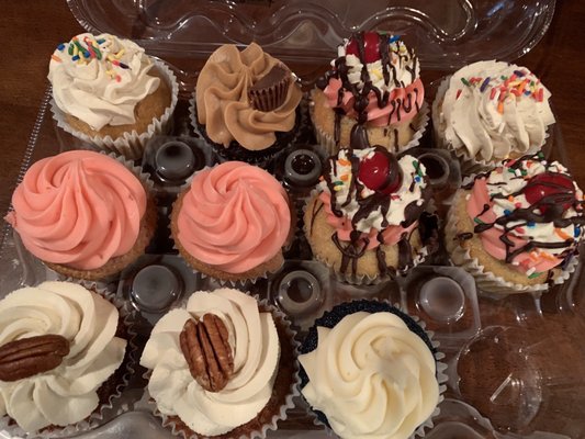 Assorted yummy cupcakes: Banana split is the one with cherry on top.