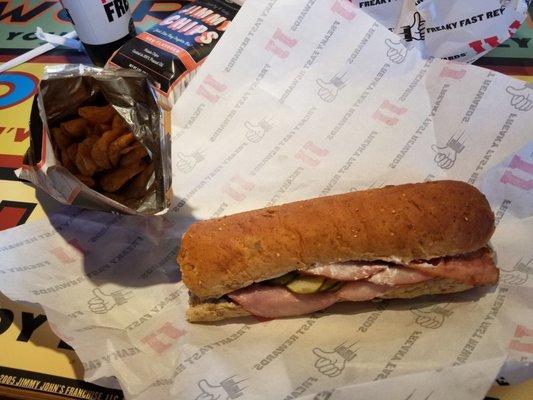 Jimmy Cubano Sandwich, bbq chips, and soda.