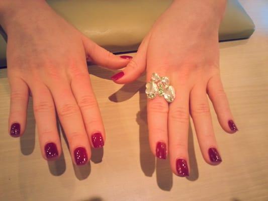 nice  shellac  gel  color .nice ring. and  pretty  girl  too