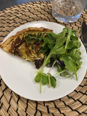 Zucchini and mozzarella rustic galette with herbs salad