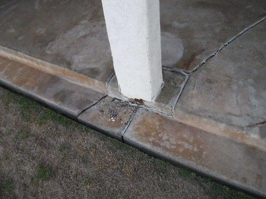 Localized failure of pad footing supporting deck post. Caused movement of the deck structure.