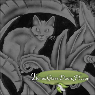 Etched glass transom window with cat and foilage. frosted design on clear glass window