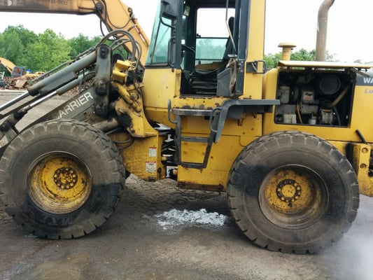 This Komatsu Tool Carrier loader w/quick attach Forks to Bucket is the best for such a small machine .