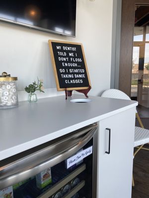 Reception area with beverage refrigerator.