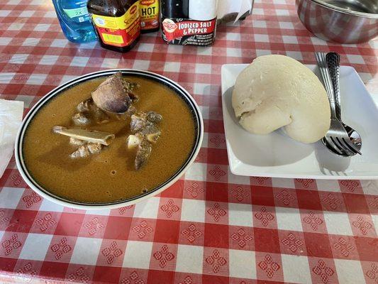 Peanut Soup with goat meet and fufu.