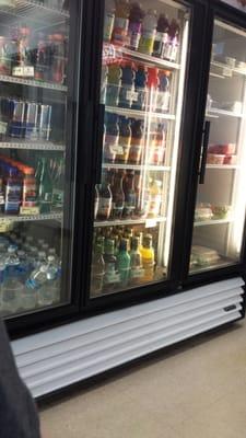 Fridges with drinks and take out salads