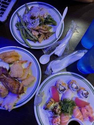 Sushi plate, breaded shrimp, fried fish, chicken skewer, string beans, chicken and broccoli