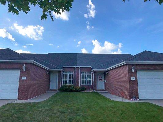 HomeShield Roofing & Exteriors before and after on 1/ 2 duplex