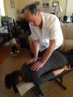 Adjusting patient J.L. at her home.