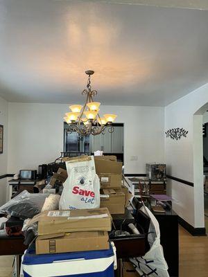 Full view of dining room ceiling painted white and chair height molding trim painted black