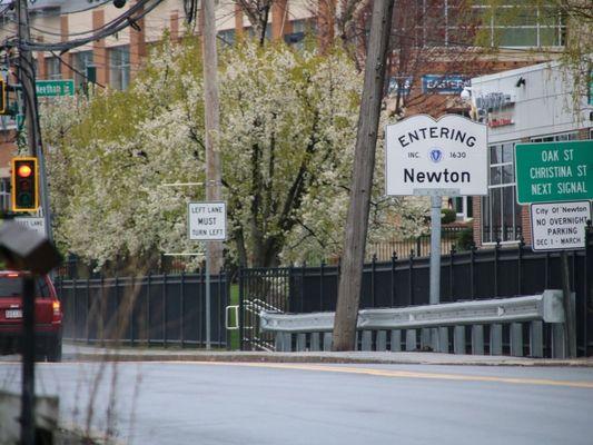 Entering Newton INC. This sign has lowercase letters...