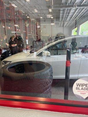 Tesla model x getting its tire changed