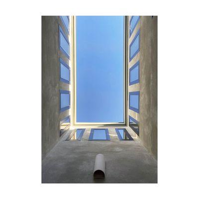 Courtyard pool, framed view of sky