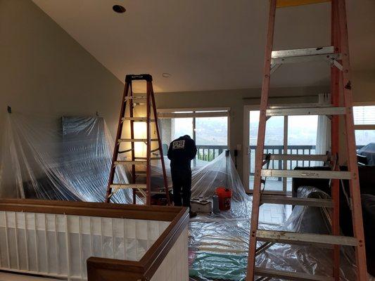 Here's Abraham installing some can lights in a vaulted ceiling in Mira Mesa.